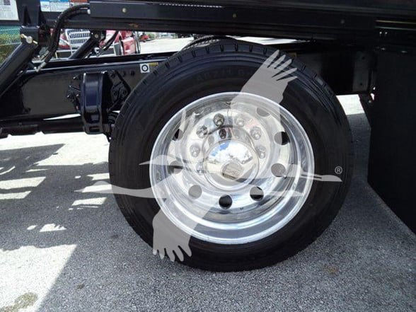 Wheel of a 2018 Peterbilt 337 chassis showing a polished steel rim and tire.
