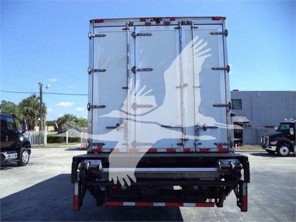 Rear view of a 2016 reefer truck with dual rear doors and a hydraulic lift gate.