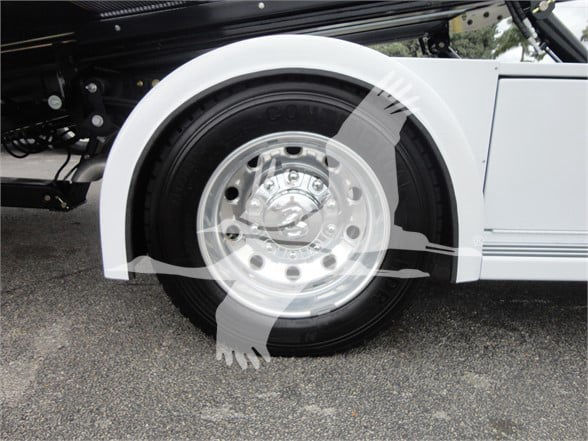 Ram 5500 HD SLT truck wheel and fender; white wheel arch and tire visible