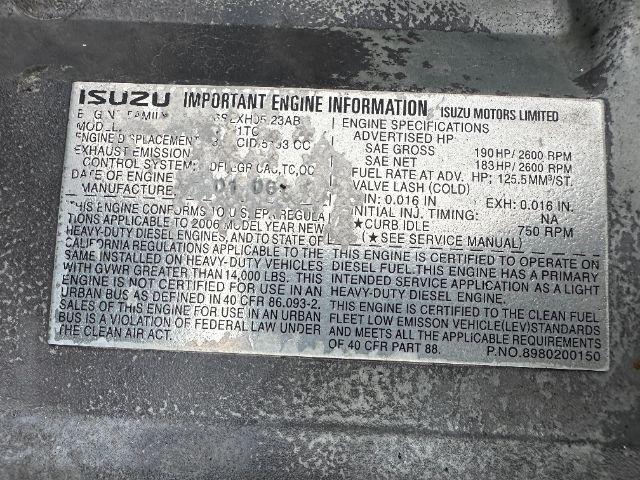 Isuzu engine information plate with various specifications and warnings, including model, engine displacement, horsepower, RPM, fuel system, and service manual references.