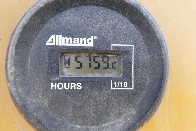 Allmand hour meter showing 15759.2 hours on a circular panel with Allmand logo.