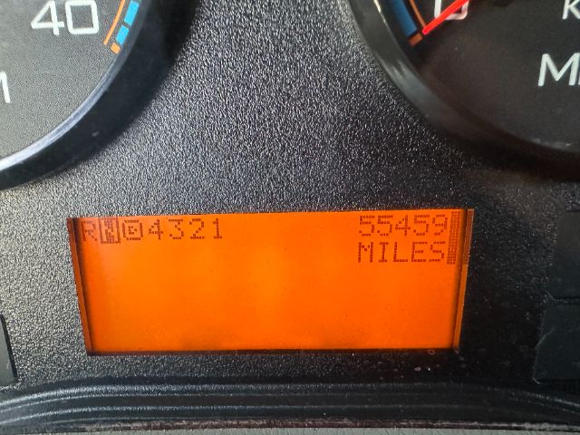 Vehicle dashboard showing an orange LCD display with odometer reading 55453 miles and a vehicle ID RW04321 on the left.