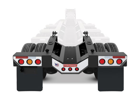  Fontaine 4th axle flip lowboy trailer rear view showing multiple axles and taillights.