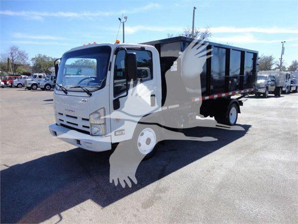 Isuzu NRR dump truck in a used inventory lot. Front cab and dump bed visible with vertical black side panels.