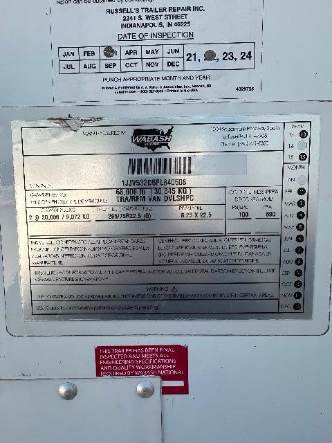Trailer data plate on a 2015 Wabash DuraPlate Dry Van showing VIN 1JJV532D5FL840508, stock H-153, trailer weight, and inspection stickers.