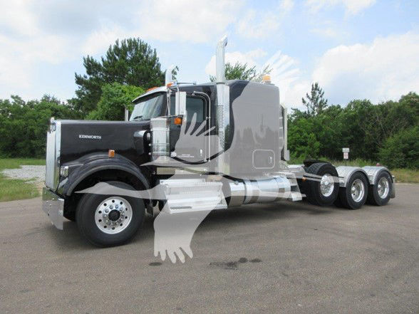 Kenworth W900B conventional sleeper truck in a used condition, side view showing front chrome bumper, black cab, chrome exhaust stacks, and triple rear axles.