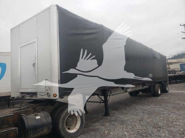 2015 Mac aluminum flatbed trailer with curtainside design, side view, VIN 5MAPA4842FA030624, stock 48-6188, used listing.
