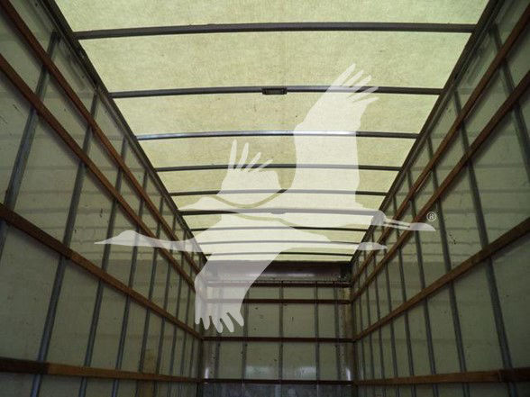 Box truck interior showing empty cargo area with metal ribs along sides.