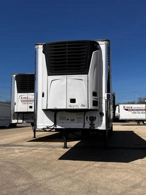 Reefer trailer with CIMC Cool Globe unit. Front view shows lift gate area and black refrigeration unit grille. Visible text includes stock number and location markings on sides.