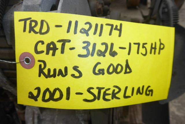 Tag showing handwritten text: 'TRD-1121174 CAT-3/26-175HP RUNS GOOD 2001-STERLING'
