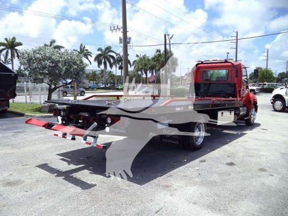 2020 Hino 268A tow truck chassis from the rear with hydraulic wheel-lift mounted on flatbed.