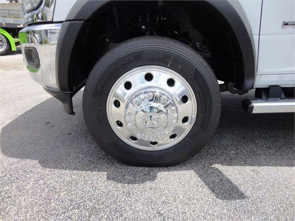 Front wheel of a 2024 Ram 4500 SLT showing a Hankook tire and chrome hubcap on the front wheel well.