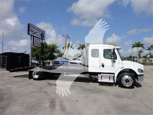2023 Freightliner BUSINESS CLASS M2 106 tow truck chassis side view with flatbed, white cab, stock number DOVETAILM2.