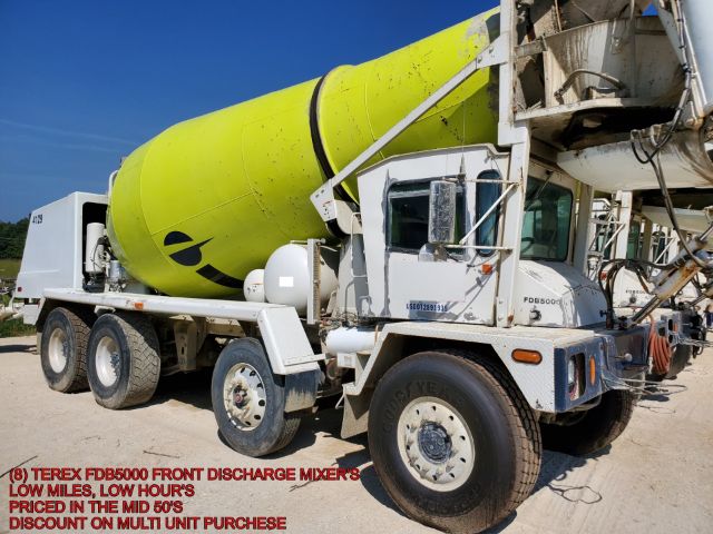 Terex FDB5000 cement mixer truck with lime green drum and white cab, front discharge mixer showing text and decals.