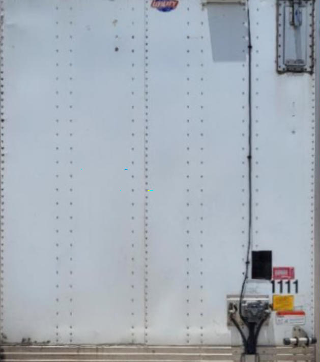 Utility trailer rear door area with Data: 1111 stock number, label 2015 Utility 4000 D-X Composite, VIN 1UYVS2538FG241501.