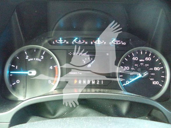 Ford F-450 dash cluster showing PRNDM2 gear selector and speedometer with 100 mph mark, tachometer 0-6k, and various indicator icons.