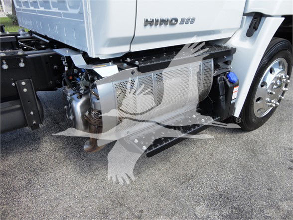 Hino 268A truck shown from side-front, with exhaust and undercarriage components visible near front wheel.