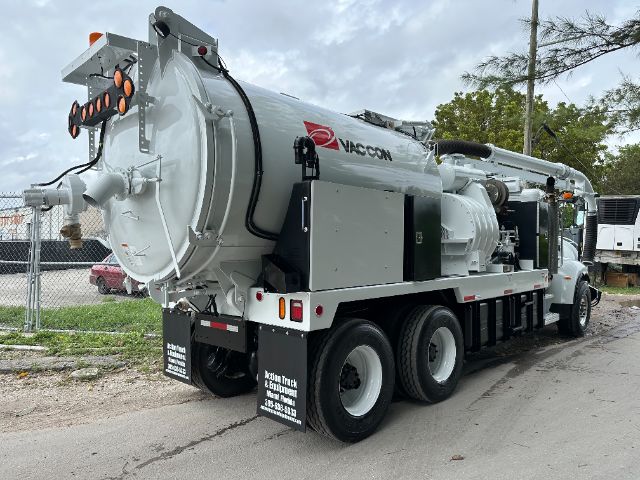 Vacuum truck rear and side view showing Vacuum tank with Vac-Con logo and equipment mounts.