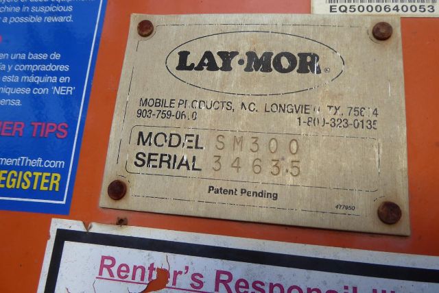 Laymor plate showing MODEL SM300 SERIAL 34635 and contact information along with patent pending note.