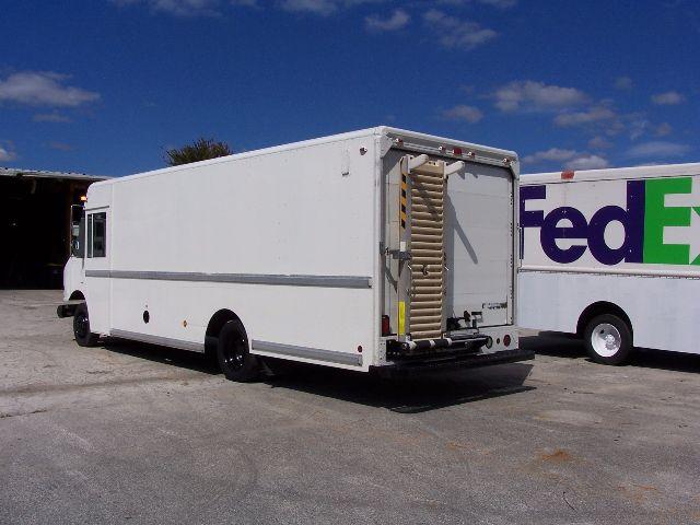 White 2005 Workhorse P42 step van rear view showing liftgate and blank cargo area.