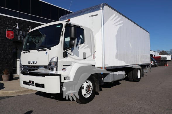 Isuzu FTR box truck exterior showing cab and cargo box with Isuzu badge.