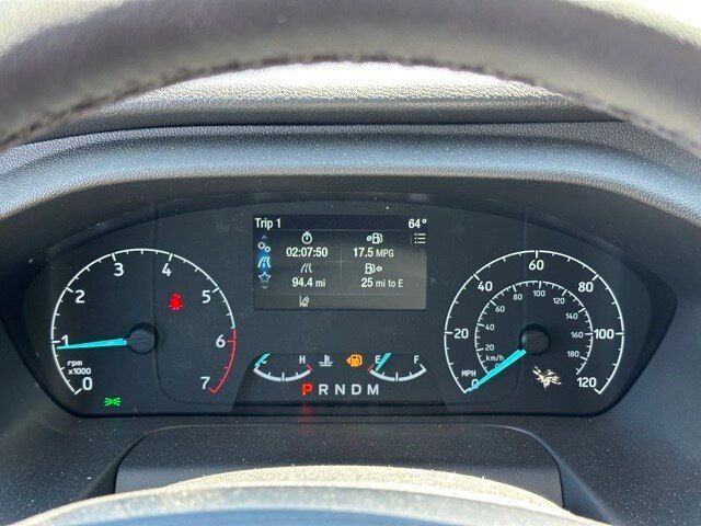 Dashboard view of a 2023 Ford Transit 350 box truck showing instrument cluster, fuel gauge, and digital trip meter reading with various icons.
