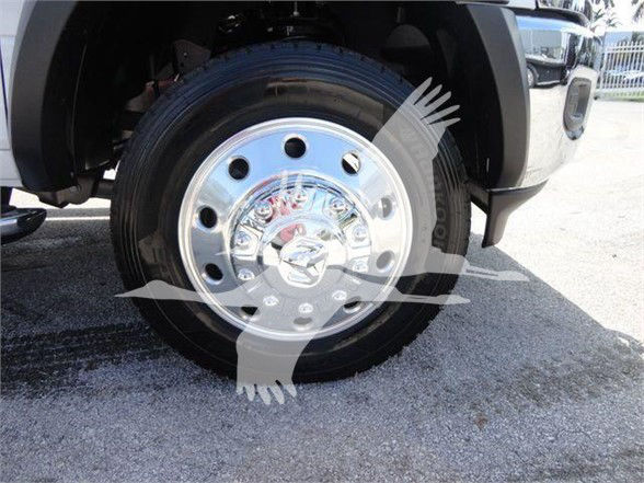 Wheel of a 2024 Ram 5500 SLT with chrome hubcap and tire showing 'Goodyear' tire branding.