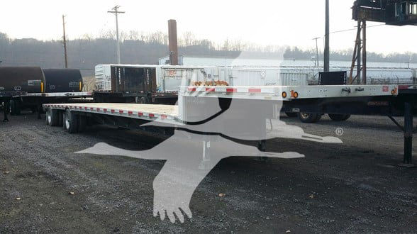 2019 Fontaine Combo Dropdeck trailer showing long flatbed, drop deck, and wheel assemblies; stock number 48-5919 visible; VIN partially readable.
