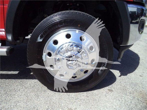 Ram 5500 wheel/tire assembly showing chrome hubcap and tire sidewall.