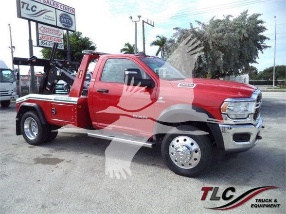 Ram 4500 Tow truck in red with tow crane in bed, VIN 3C7WRKAL9RG164735 visible