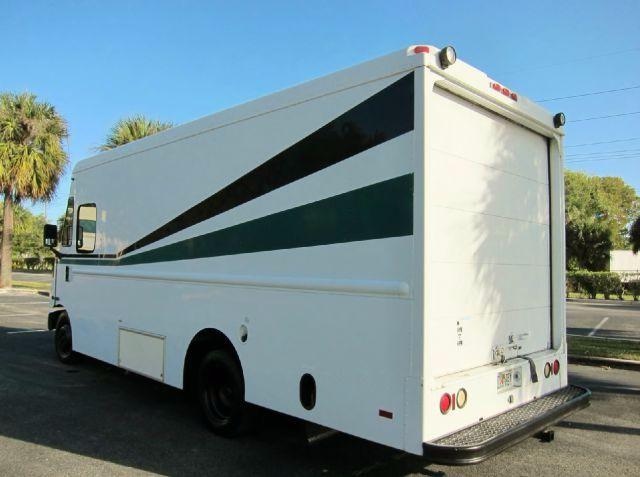 Workhorse P42 step van rear and side view with graphic stripe on white body.
