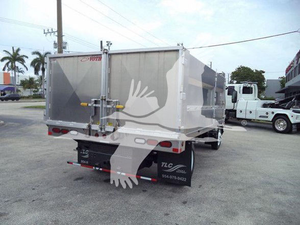Isuzu NPR HD dump truck rear view showing cargo bed and taillights.