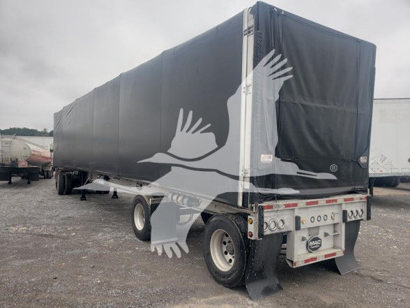 Mac aluminum flatbed trailer with curtainside, rear view showing tail lights and covered bed.