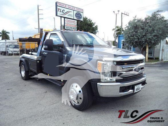 2017 Ford F450 tow truck in a dealership lot, front three-quarter view with TLC Truck & Equipment watermark.