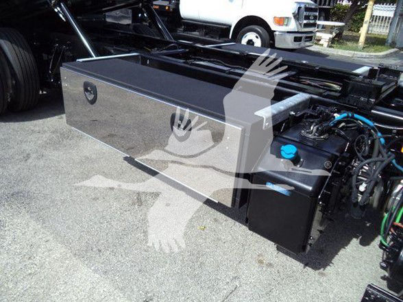 2019 International DURASTAR 4300 truck with a large rectangular aluminum toolbox mounted behind the cab and various hoses and components visible.