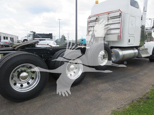 Kenworth W900L truck chassis with rear dual wheels and sleeper cab, viewed from side; visible exhaust stack and fuel tanks.