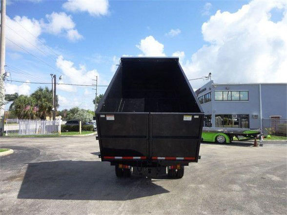 Isuzu NPR-HD dump truck bed shown from rear with open-top dump bed and dual rear wheels.
