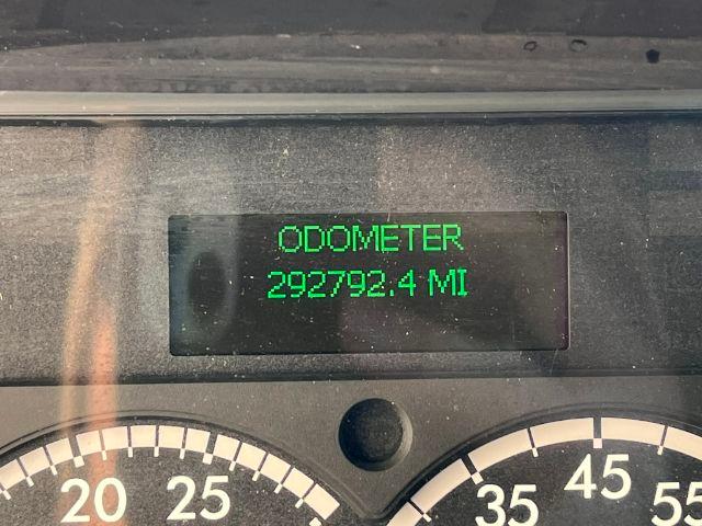 Dashboard odometer reading 'ODOMETER 292792.4 MI' displayed on a Freightliner M2 106 dash.