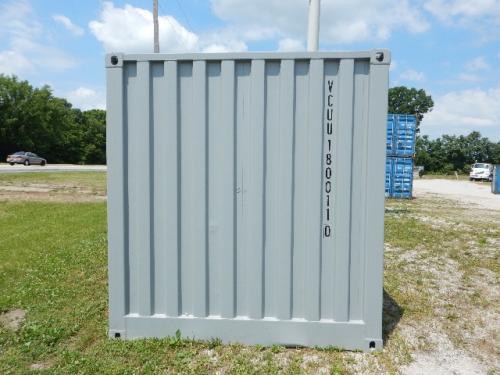 Shipping container door with vertical corrugations and identification code VCUI18000100.
