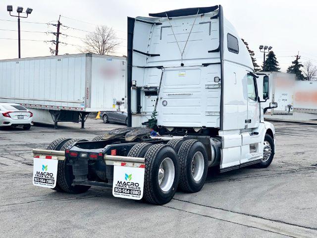 Volvo VNL 670 truck rear view showing tractor frame and tandem axles