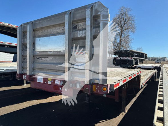 Fontaine 48' spear air combo drop deck Rasr rail sliding trailer rear view showing drop deck and metal side rails.
