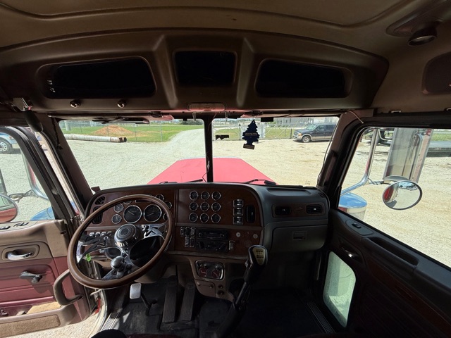 Peterbilt 379 truck interior dashboard and steering wheel view from driver seat.