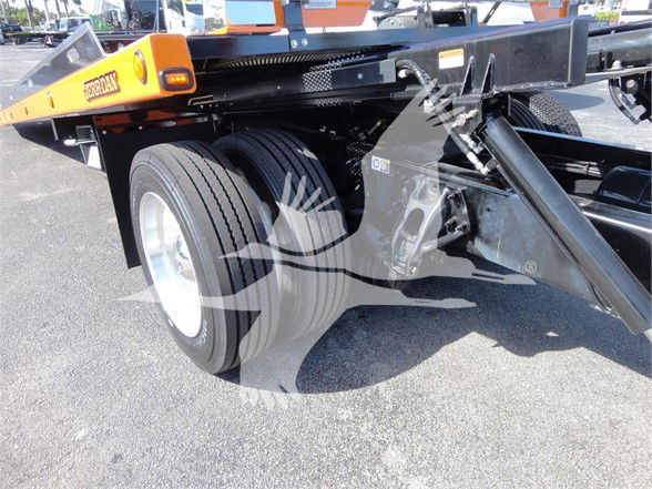 Peterbilt 337 tow truck chassis showing dual rear wheels and components of the fifth wheel/flatbed area