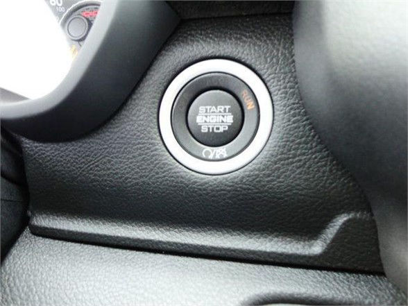 Ram 4500 dashboard area showing push-button Start Engine Stop in black/gray surround.