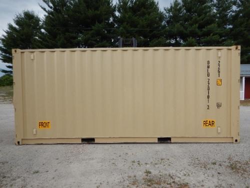 20' double door shipping storage container with front and rear labels, beige color, placed on gravel.