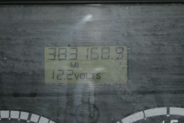 Dashboard display showing mileage 303168.9 and voltage 12.2 Volts.