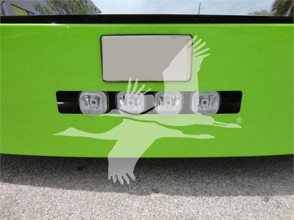 Peterbilt 337 rear tail area showing three square trailer electrical connectors in a green truck bed.