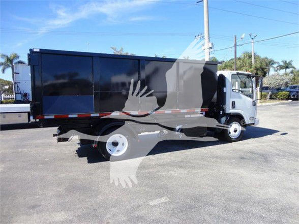 Isuzu NRR truck with a large refuse body, side view showing the cab and container. No legible serials or labels visible in this image.