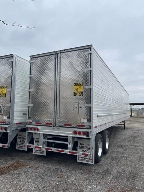 CIMC Cool Globe Reefer van trailer rear view with diamond plate doors and dual rear axles.