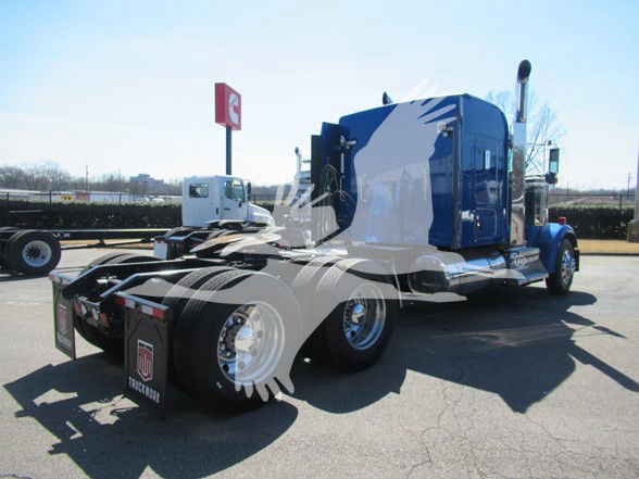 Kenworth W900L tractor in blue with sleeper cab, side view showing rear fenders and dual rear axles.